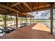 Covered boat dock with two lifts and a spacious deck at 4848 Island Shores Ln, Lakeland, FL 33809