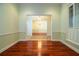 Formal dining room featuring hardwood floors and light walls at 4848 Island Shores Ln, Lakeland, FL 33809