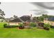 Single-Gathering home with pool and manicured lawn at 4848 Island Shores Ln, Lakeland, FL 33809