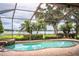 Enjoy this amazing view from your screened in pool at 4848 Island Shores Ln, Lakeland, FL 33809