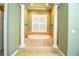 Relaxing bathroom with a freestanding oval tub, and white columns at 4848 Island Shores Ln, Lakeland, FL 33809