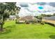 House with a large backyard and lake access at 4848 Island Shores Ln, Lakeland, FL 33809
