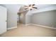 Bright bedroom with ceiling fan and neutral colored walls at 4848 Island Shores Ln, Lakeland, FL 33809