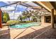 Screened pool and spa with stunning lake views at 4848 Island Shores Ln, Lakeland, FL 33809