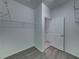 Spacious closet with built-in shelving and access to bathroom at 5217 Snowy Heron Dr, Lakeland, FL 33812