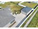 Aerial view showing house, detached garage and backyard at 4756 Acorn Dr, Mulberry, FL 33860