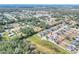 Aerial view showing home's location in a residential neighborhood at 4756 Acorn Dr, Mulberry, FL 33860