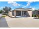 Large backyard with screened patio and basketball court at 4756 Acorn Dr, Mulberry, FL 33860