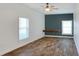 Bright bedroom featuring tile floors and ceiling fan at 4756 Acorn Dr, Mulberry, FL 33860