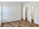 Spacious bedroom with wood-look floors and ample closet space at 4756 Acorn Dr, Mulberry, FL 33860