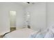 Bedroom with wood-look floors and access to closet and bathroom at 4756 Acorn Dr, Mulberry, FL 33860
