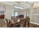 Open dining area with a view into the living area and kitchen at 4756 Acorn Dr, Mulberry, FL 33860
