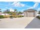 Detached garage with basketball court and ample parking space at 4756 Acorn Dr, Mulberry, FL 33860