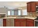 Kitchen island with sink and breakfast bar at 4756 Acorn Dr, Mulberry, FL 33860