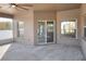 Covered patio with windows and sliding glass door at 4756 Acorn Dr, Mulberry, FL 33860
