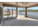 Spacious screened porch with ceiling fan and views at 4756 Acorn Dr, Mulberry, FL 33860