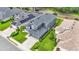 Aerial view showcasing the house, landscaping, and neighborhood at 6857 Eagle Ridge Loop, Lakeland, FL 33813