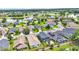 Wide aerial view of a residential community near a lake and golf course at 6857 Eagle Ridge Loop, Lakeland, FL 33813