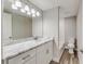 Modern bathroom with white cabinets and marble countertop at 2907 Ellis Ave, Lakeland, FL 33803