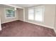 Spacious bedroom with window, closet and carpet at 714 Winfree Ave, Lakeland, FL 33801