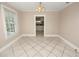 Bright dining room with tile floors and kitchen access at 714 Winfree Ave, Lakeland, FL 33801