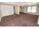 Spacious bedroom with double closets and carpeted floor at 714 Winfree Ave, Lakeland, FL 33801