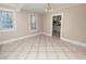 Charming dining room with tile floors and kitchen access at 714 Winfree Ave, Lakeland, FL 33801