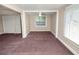 Bright bedroom with carpeted floor and ceiling fan at 714 Winfree Ave, Lakeland, FL 33801
