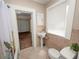 Clean bathroom featuring a pedestal sink and shower/tub combo at 714 Winfree Ave, Lakeland, FL 33801