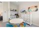 Small kitchenette with microwave, sink, and cabinets at 544 Narrow Pond Rd, Polk City, FL 33868
