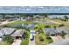 Aerial view showcasing a home near a tranquil lake at 544 Narrow Pond Rd, Polk City, FL 33868