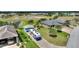 Aerial view of house, RV, and lake at 544 Narrow Pond Rd, Polk City, FL 33868