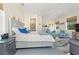 Spacious main bedroom with sitting area and ensuite bathroom at 544 Narrow Pond Rd, Polk City, FL 33868