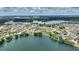 Property sits on a large lot with water views at 544 Narrow Pond Rd, Polk City, FL 33868