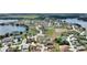 Aerial view showing home's location in a waterfront community at 544 Narrow Pond Rd, Polk City, FL 33868