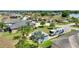 Aerial view of house and RV near a lake at 544 Narrow Pond Rd, Polk City, FL 33868