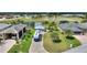 Aerial view of house and RV near a lake at 544 Narrow Pond Rd, Polk City, FL 33868