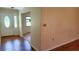 Bright entryway with hardwood floors and access to other rooms at 2602 Ewell Rd, Lakeland, FL 33811