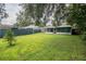 Spacious backyard perfect for outdoor activities at 1216 Pinewood Ave, Lakeland, FL 33815