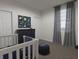 Charming bedroom with a crib and dresser, perfect for a Bedroom at 265 Crossings Ave, St Cloud, FL 34771