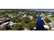 Aerial view of waterfront community with many houses and canals at 180 Lakeview Dr, Haines City, FL 33844