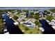 Aerial view of waterfront home with private pool and canal access at 180 Lakeview Dr, Haines City, FL 33844