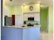 Kitchen boasts granite countertops and stainless steel appliances at 180 Lakeview Dr, Haines City, FL 33844