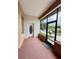 Screened porch with water views and access door at 180 Lakeview Dr, Haines City, FL 33844