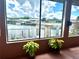 Stunning view from screened porch overlooking water at 180 Lakeview Dr, Haines City, FL 33844