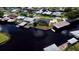 Aerial view of waterfront home with private dock and canal access at 180 Lakeview Dr, Haines City, FL 33844