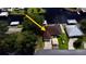 Aerial view of single Gathering home with carport and shed at 180 Lakeview Dr, Haines City, FL 33844