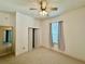 Bedroom with ceiling fan and window coverings at 180 Lakeview Dr, Haines City, FL 33844