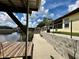 Wooden dock with canal access and waterfront views at 180 Lakeview Dr, Haines City, FL 33844