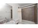 Updated bathroom with a tub shower, new vanity and flooring at 6094 Eagle Pointe Dr, Lakeland, FL 33812